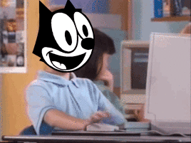 Felix the Cat face-swap meme at the computer