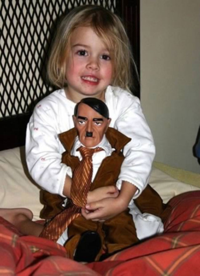 Kid hugs Hitler doll — bizarre forum meme moment