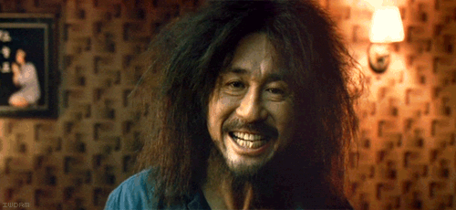 Wild-haired laughing guy reaction meme, forum classic