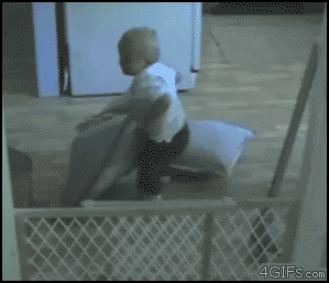 Kid climbing on pillows caught on camera, classic funny GIF