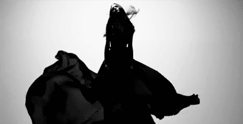 Dramatic silhouette dancer GFX in flowing black cloth