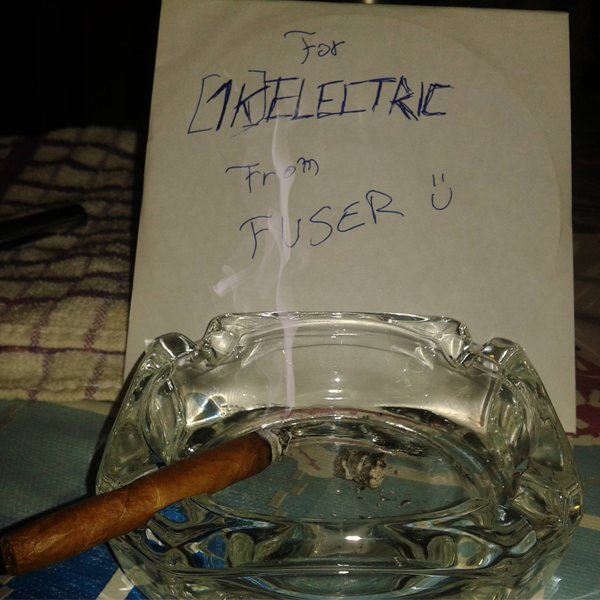 Cigar smoke curls beside a handwritten shoutout note