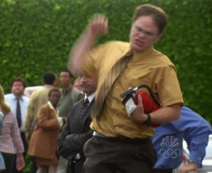 Dwight Schrute mid-punch, classic Office meme moment