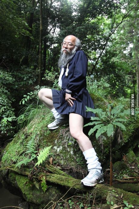 Old man rocks a schoolgirl uniform in the woods