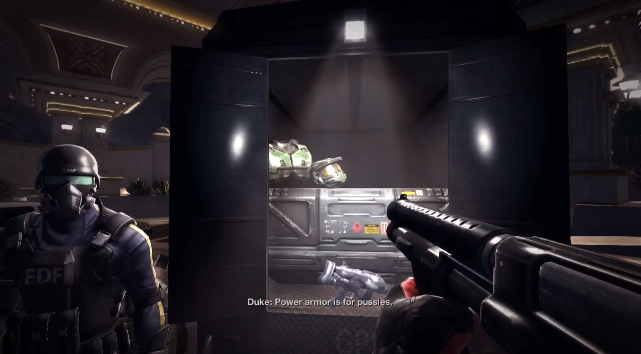 Duke Nukem mocks power armor in a Halo weapons crate