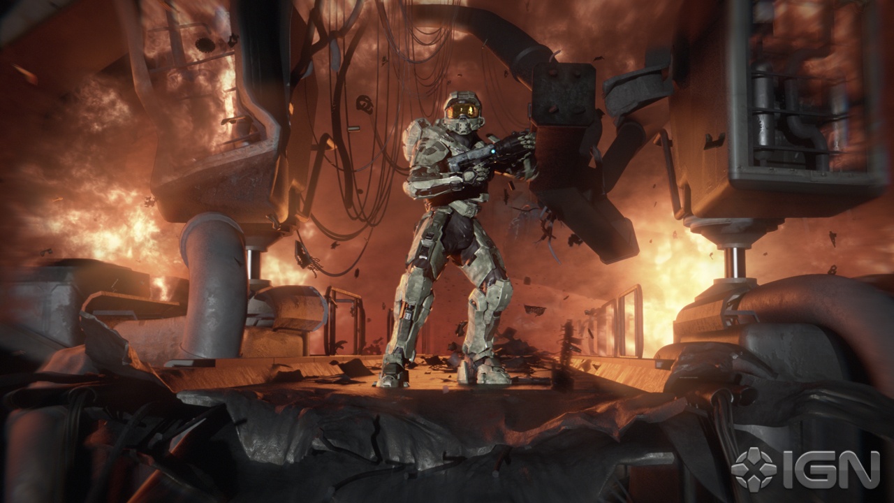 Master Chief standing tall amid fiery Halo 4 wreckage