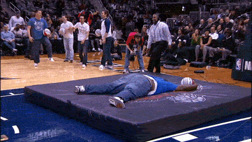 Guy face-plants flat on gym floor mat, epic fail
