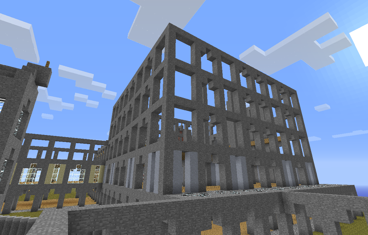 Unfinished Minecraft building skeleton against blue sky